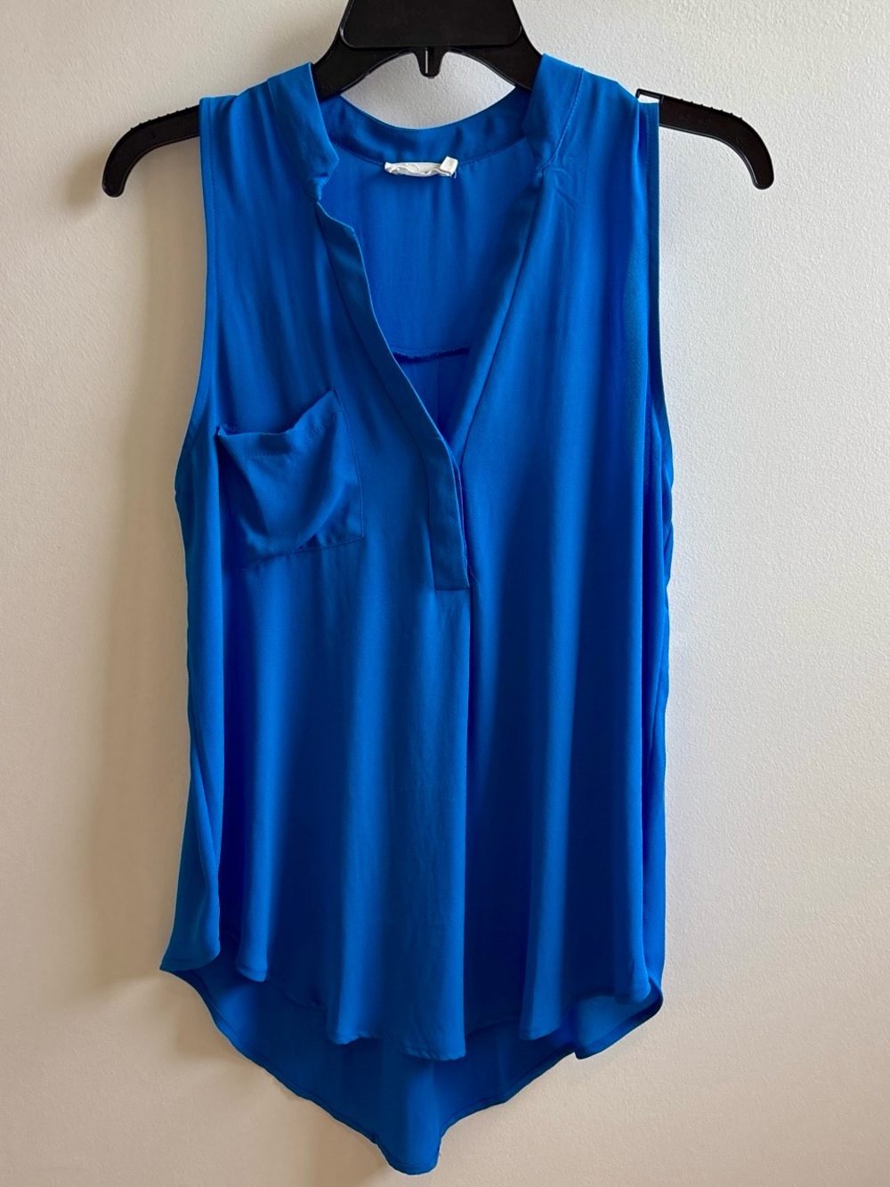 Lush Blue sleeveless blouse.